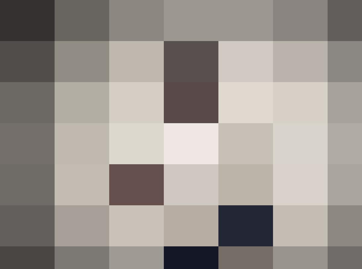 A man in a suit is training with dumbbells.