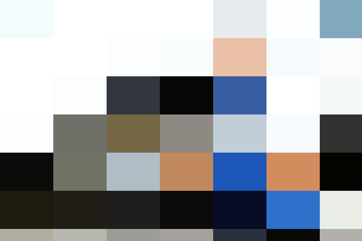 A man in overalls kneeling next to a white car was announced as one of the finalists for the National Apprenticeship Awards.