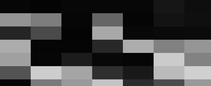 Black and white photo of a smiling man in a suit surrounded by personnel taking pictures at a sports event.