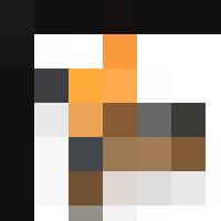 A person sitting at a desk with laptops, managing personnel and HR.