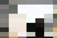 A group of personnel gathered around a computer screen, engaging in people management discussions.