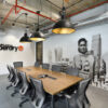 A table and chairs in an Superdry office.