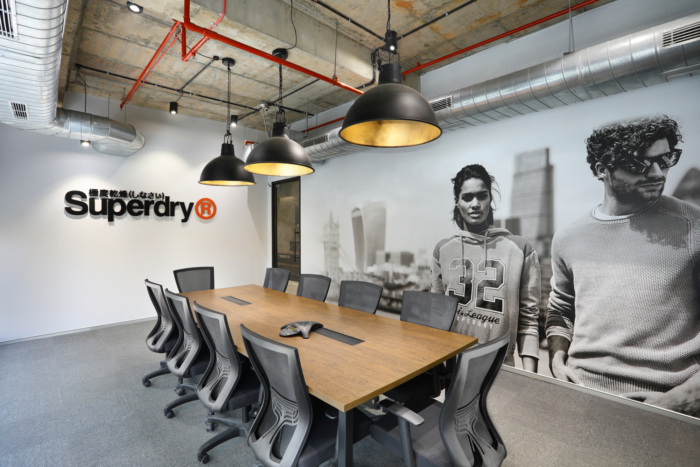 superdry-offices A table and chairs in an Superdry office.