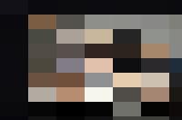 A group of women posing on a white couch for HR purposes.