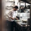 A chef working in a kitchen.